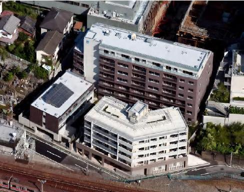 完成した2つの建物の外観。奥のL字型の建物が「ヒューリックレジデンス茗荷谷」